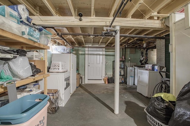 unfinished below grade area featuring separate washer and dryer