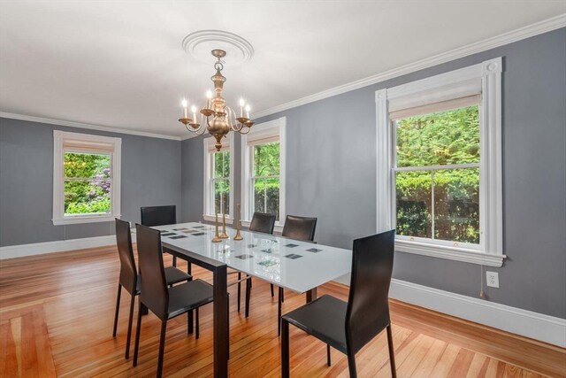 51 Summer St, Weston, MA 02493 - dining space featuring baseboards, a chandelier, light wood finished floors, and ornamental molding