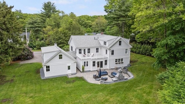 51 Summer St, Weston, MA 02493 - back of house featuring a patio area, a yard, and a view of trees