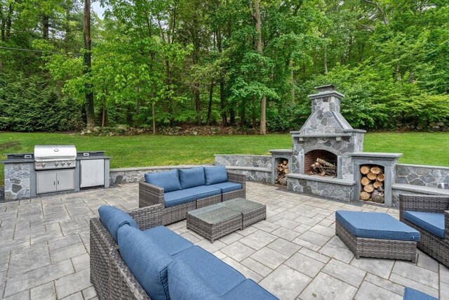 51 Summer St, Weston, MA 02493 - view of patio / terrace with an outdoor living space with a fireplace