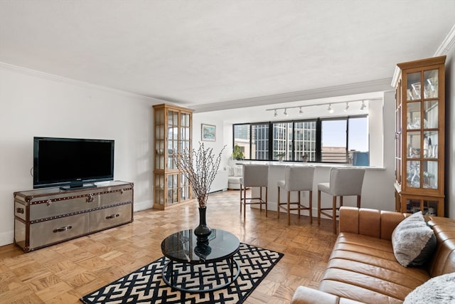 living room featuring light parquet floors and crown molding