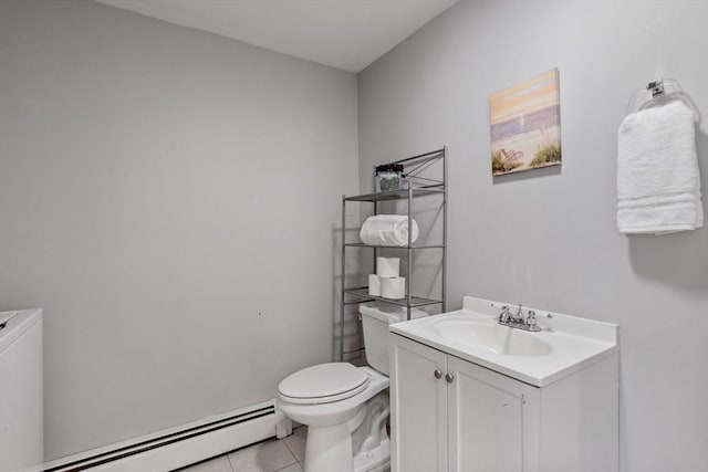 half bath with a baseboard radiator, toilet, vanity, and tile patterned floors