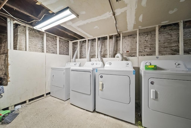 washroom with washer and clothes dryer