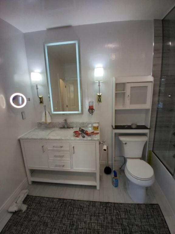 14 Russell St, Everett, MA 02149 - bathroom featuring vanity and bathtub / shower combination