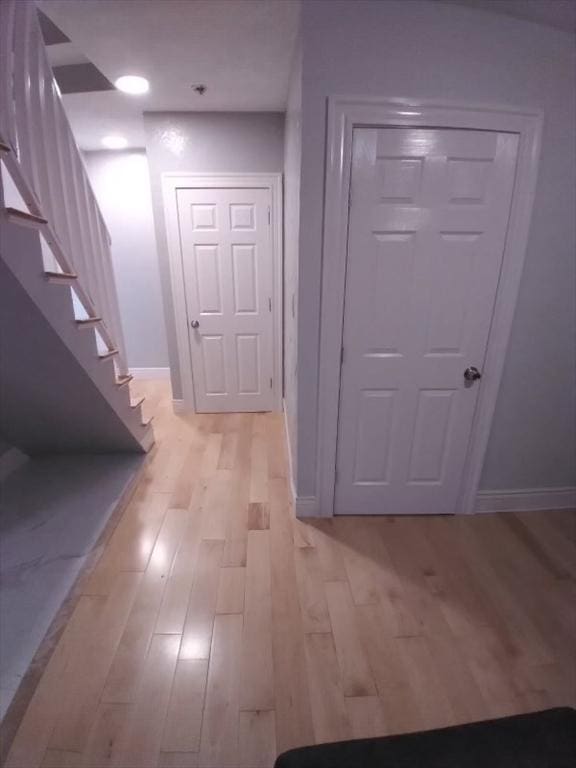 14 Russell St, Everett, MA 02149 - hallway featuring light wood-style flooring and stairway