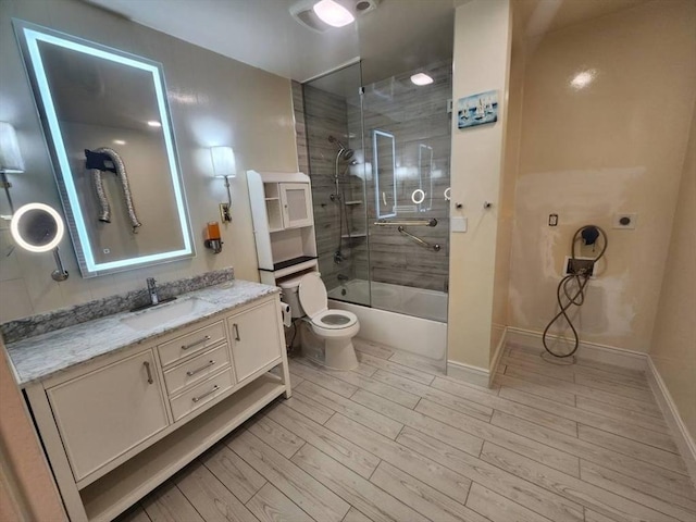 14 Russell St, Everett, MA 02149 - bathroom featuring vanity, wood finished floors, and shower / bath combination