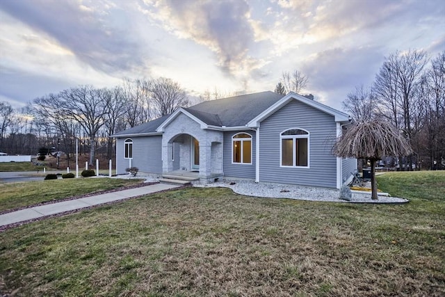 ranch-style house with a front yard