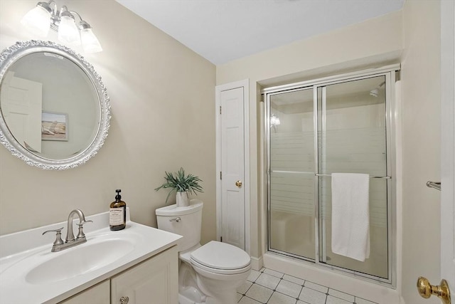 full bathroom with tile patterned floors, vanity, toilet, and a shower stall