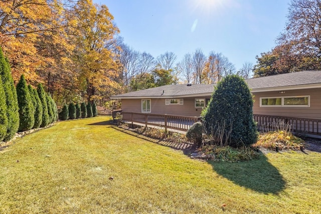 view of yard featuring a deck