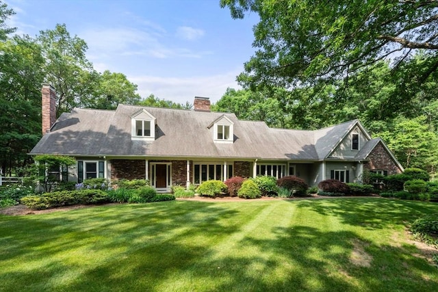 8 Pleasant St, Dover, MA 02030 - cape cod home with a chimney and a front lawn