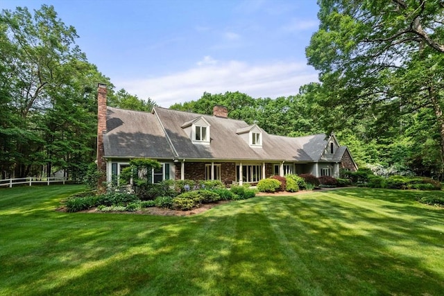8 Pleasant St, Dover, MA 02030 - cape cod-style house with a front yard and a chimney