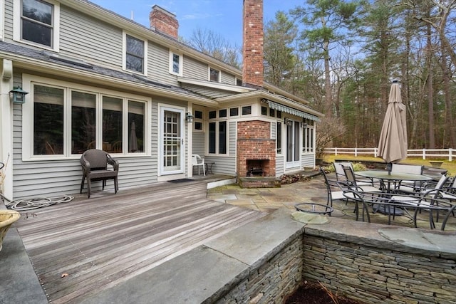 8 Pleasant St, Dover, MA 02030 - wooden terrace featuring an outdoor brick fireplace and a patio area