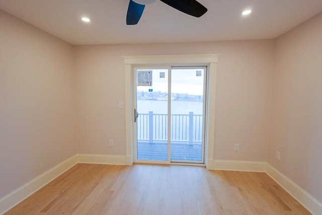unfurnished room with light wood-style floors, ceiling fan, recessed lighting, and baseboards
