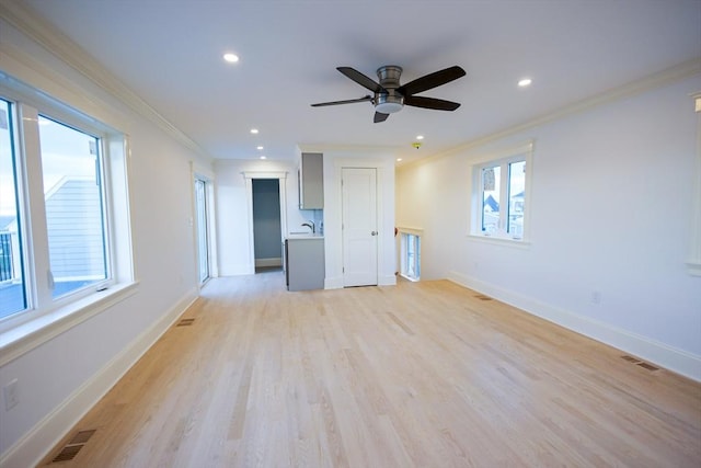 spare room with ornamental molding, recessed lighting, visible vents, and ceiling fan