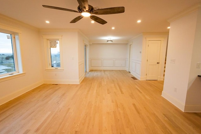 spare room featuring ornamental molding, recessed lighting, a ceiling fan, and light wood-style floors