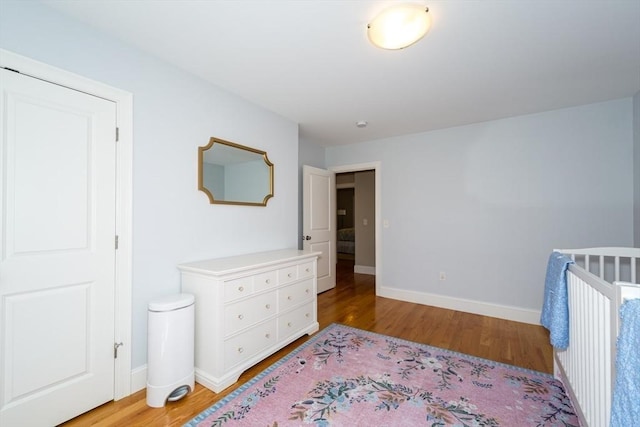 70 Rockland St, Natick, MA 01760 - bedroom with baseboards and light wood-style flooring