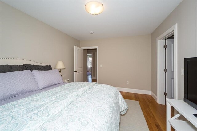 70 Rockland St, Natick, MA 01760 - bedroom featuring baseboards and wood finished floors