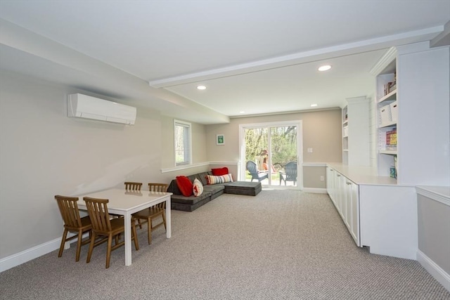 70 Rockland St, Natick, MA 01760 - living area with recessed lighting, baseboards, a wall mounted AC, and light carpet
