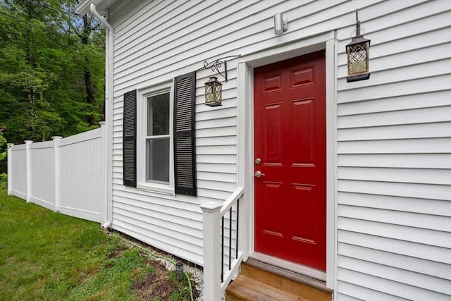 property entrance featuring fence