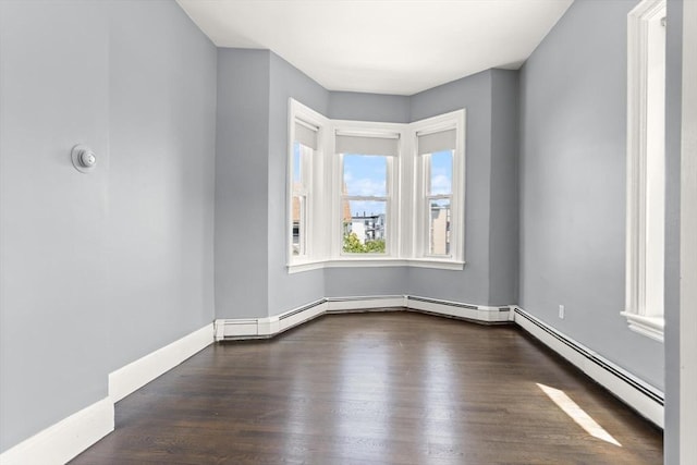 17 Savin Hill Ave Unit 3, Boston, MA 02125 - spare room with wood finished floors and baseboards