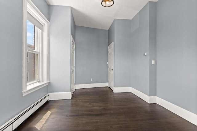 17 Savin Hill Ave Unit 3, Boston, MA 02125 - spare room with a baseboard radiator and wood finished floors