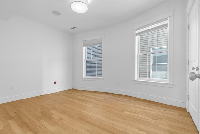 empty room featuring light hardwood / wood-style floors