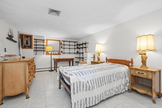 bedroom with light tile patterned floors and visible vents