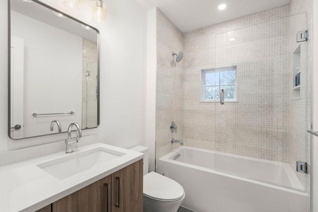 full bathroom with vanity,  shower combination, and toilet