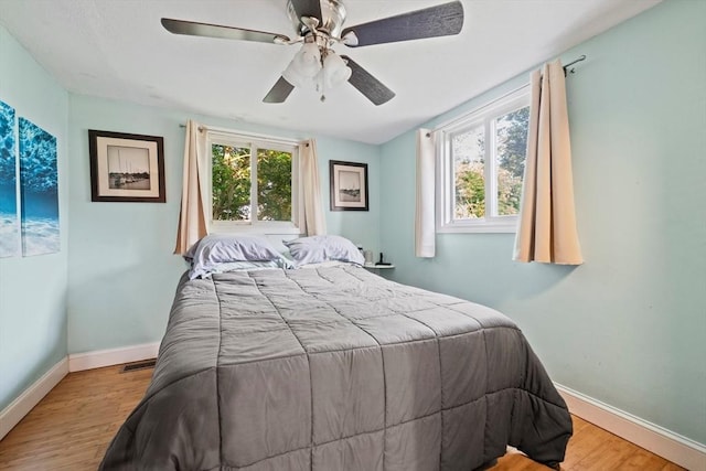 19 Borden, Scituate, MA 02066 - bedroom with wood finished floors and a ceiling fan