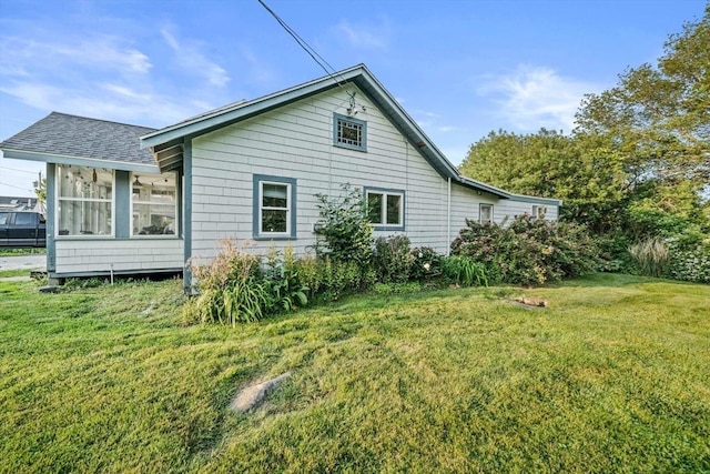 19 Borden, Scituate, MA 02066 - view of side of home with a yard and a shingled roof