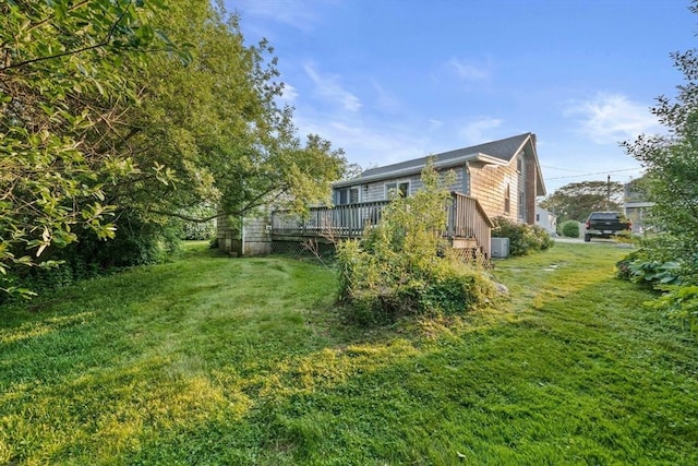 19 Borden, Scituate, MA 02066 - view of green lawn with a wooden deck