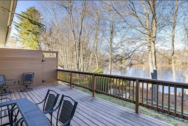 deck featuring a water view