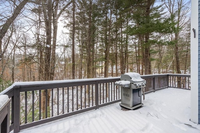 snow covered deck with area for grilling