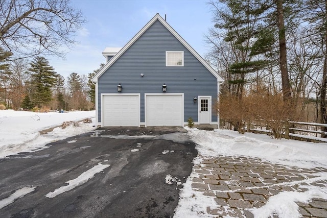 exterior space featuring a garage