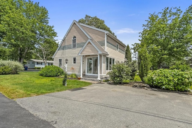6 N Rd, Mattapoisett, MA 02739 - view of front of home with a front lawn