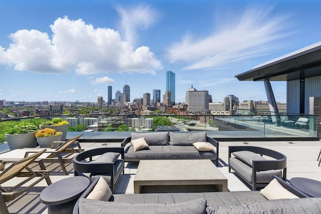 view of patio featuring a skyline view and outdoor lounge area