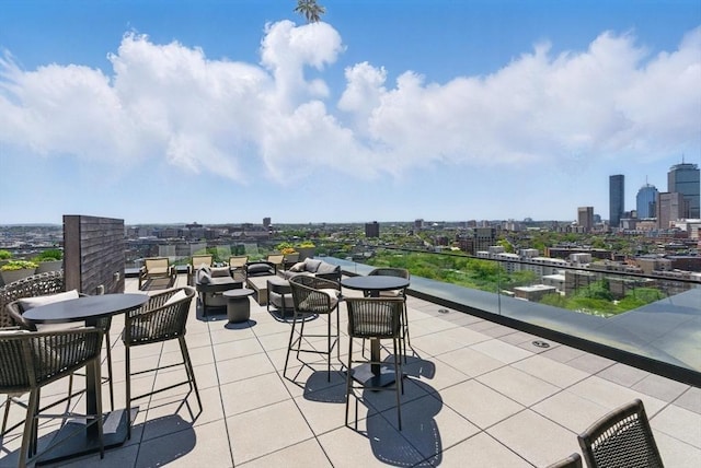 view of patio / terrace featuring a view of city