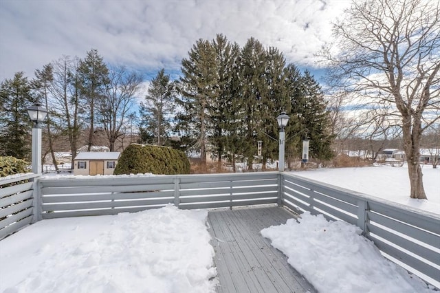 view of snow covered deck