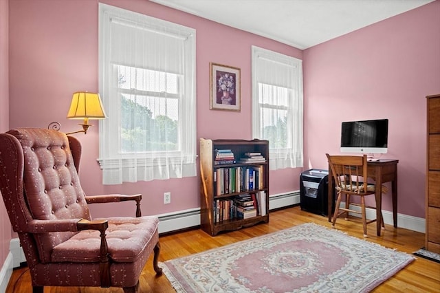 2 Christin Way, Woburn, MA 01801 - living area with a baseboard radiator and wood finished floors