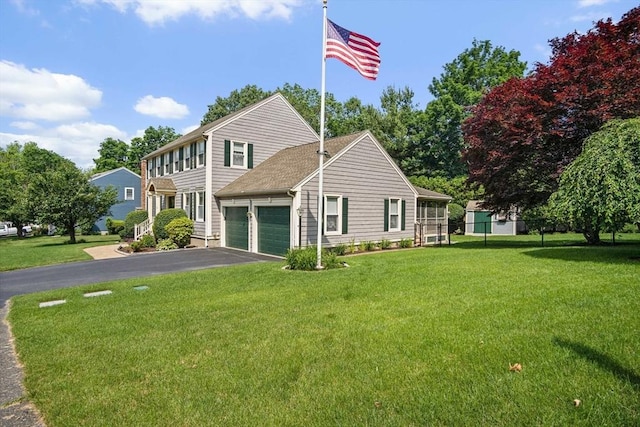 2 Christin Way, Woburn, MA 01801 - colonial house featuring asphalt driveway and a garage