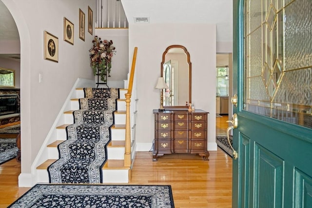 2 Christin Way, Woburn, MA 01801 - foyer featuring wood finished floors, stairs, and arched walkways