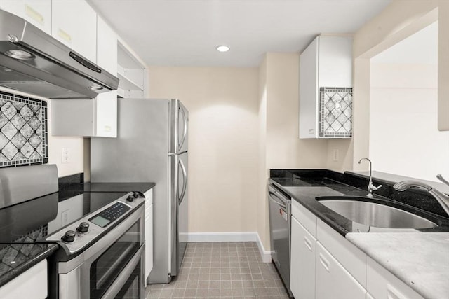 931 Massachusetts Ave Unit 1003, Cambridge, MA 02139 - kitchen featuring exhaust hood, stainless steel appliances, white cabinetry, and recessed lighting