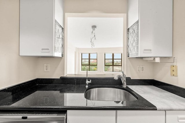 931 Massachusetts Ave Unit 1003, Cambridge, MA 02139 - kitchen featuring white cabinets, dishwasher, and dark stone counters