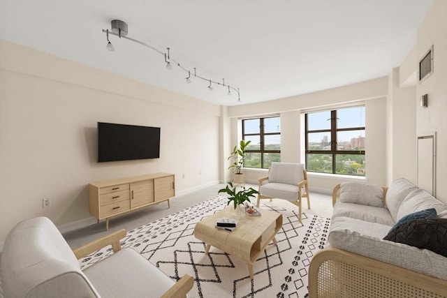 931 Massachusetts Ave Unit 1003, Cambridge, MA 02139 - living room with light carpet and rail lighting