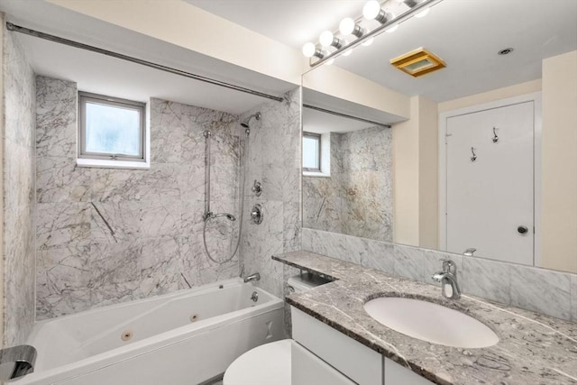 931 Massachusetts Ave Unit 1003, Cambridge, MA 02139 - bathroom featuring vanity and a combined bath / shower with jetted tub