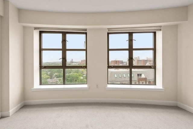 931 Massachusetts Ave Unit 1003, Cambridge, MA 02139 - carpeted spare room featuring baseboards