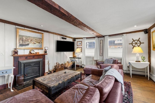 164 Water St Unit 164, Newburyport, MA 01950 - living room featuring beam ceiling, hardwood / wood-style floors, a glass covered fireplace, and baseboards