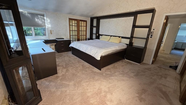 17 Crowningshield Dr, Paxton, MA 01612 - bedroom with french doors, light carpet, lofted ceiling, and wallpapered walls