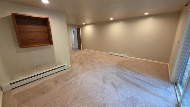 17 Crowningshield Dr, Paxton, MA 01612 - spare room with a baseboard heating unit, light carpet, recessed lighting, and a baseboard radiator