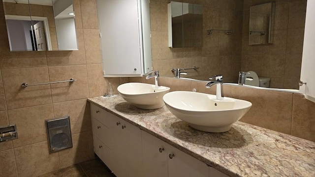 17 Crowningshield Dr, Paxton, MA 01612 - bathroom featuring tile walls, double vanity, and tile patterned flooring